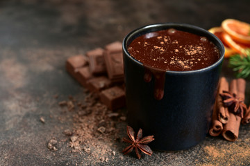 Homemade christmas hot chocolate with orange and spices.