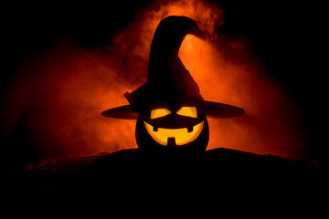 Halloween concept. Jack-o-lantern smile and scary eyes for party night. Close up view of scary...