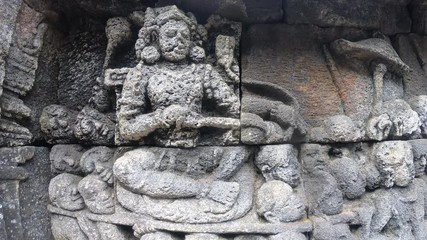 Stone images in the temple of Borabudur in Java island, Indonesia