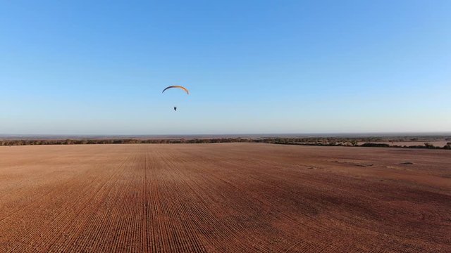 Parachutist doing some extreme sports paramotoring