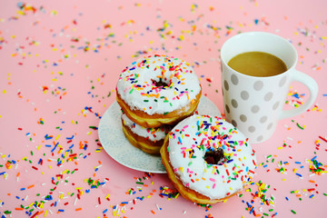 cup of coffee and donuts
