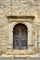 Fototapeta na wymiar Old Church Porch With Wooden Door