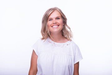 Fototapeta premium Portrait of blonde young woman over isolated background