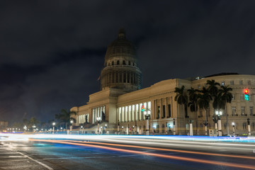 Capitol at night with cars, Havana, Cuba.