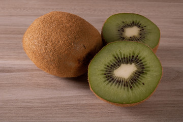 fresh kiwi fruit on wooden background