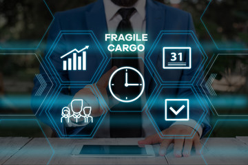 Handwriting text writing Fragile Cargo. Conceptual photo Breakable Handle with Care Bubble Wrap Glass Hazardous Goods Male human wear formal work suit presenting presentation using smart device