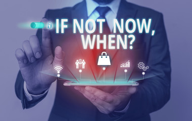 Writing note showing If Not Now When Question. Business concept for start acting from this moment do not hesitate Male wear formal suit presenting presentation smart device