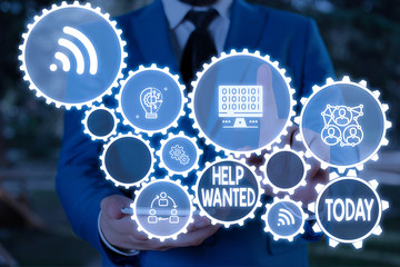 Text sign showing Help Wanted. Business photo text An ad in the paper an employer places to find a...