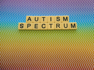 Bright rainbow zig zag pattern background sign with the words 