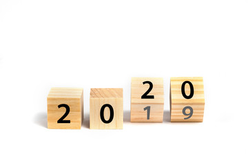 New year 2020 concept with wooden cubes