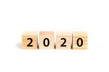 New year 2020 concept with wooden cubes