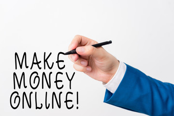 Text sign showing Make Money Online. Business photo showcasing making profit using internet like freelancing or marketing Isolated hand above white background. Pointing pen in the hand on white