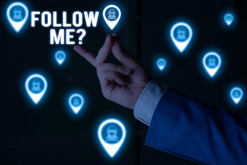 Text sign showing Follow Me Question. Business photo showcasing go or come after demonstrating or thing proceeding ahead Male human wear formal work suit presenting presentation using smart device