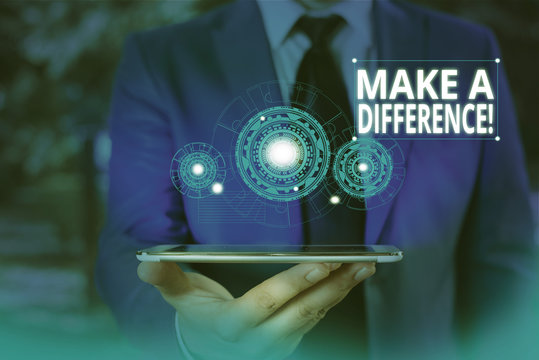 Conceptual hand writing showing Make A Difference. Concept meaning have significant effect or non on demonstrating or situation Male wear formal suit presenting presentation smart device