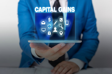 Text sign showing Capital Gains. Business photo showcasing Bonds Shares Stocks Profit Income Tax Investment Funds
