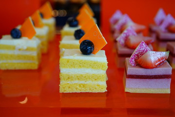 Petits fours mini cakes in bite size pieces