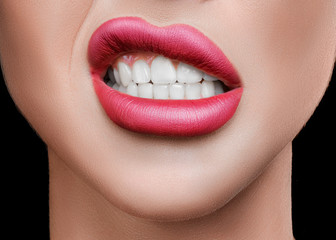 Close up woman mouth. Red lips and perfect teeth