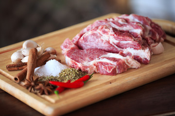 Close up raw pork on cutting board