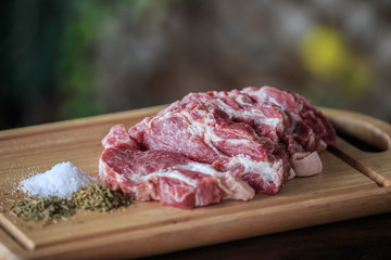 Close up raw pork on cutting board