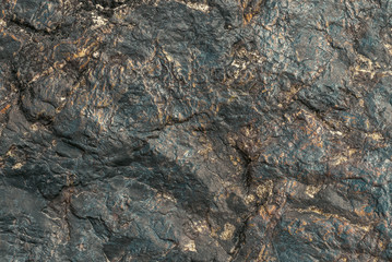 Natural brutal stone background with cracks and creases