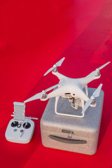 white drone isolated on color background
