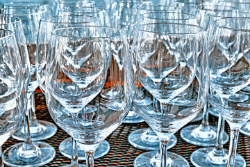 empty glass for wine abstract background closeup side view of row of glasses on restaurant table...