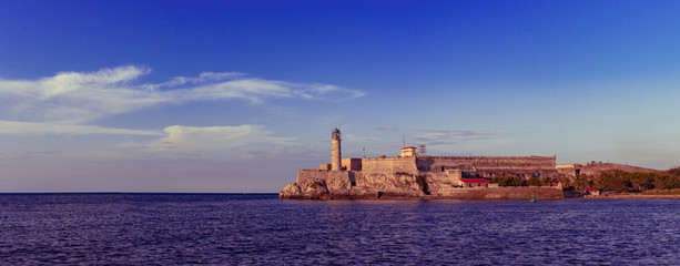 Obraz premium panoramic view of the lighthouse in Old Havana during sunset