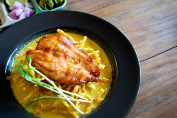 Khao Soi , Northern Thai Style Curried Noodle Soup with grilled Chicken
