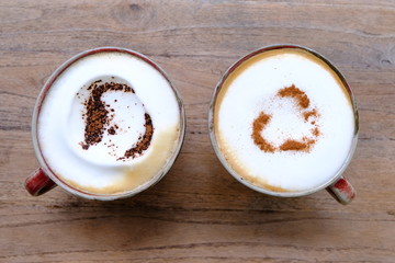 cup of coffee on wooden table