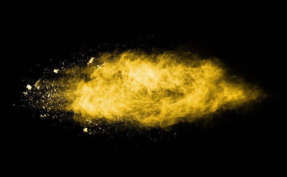 Yellow Color Powder Explosion On White Background.