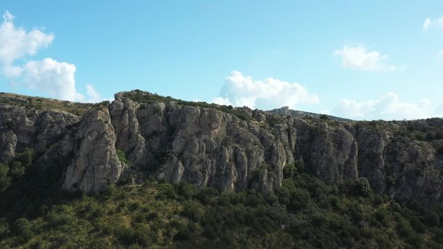 View from above, stunning aerial view of Monte Ruju located in Capo Figari. The Capo Figari promontory is a regional nature reserve in Sardinia, Italy.