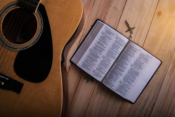 Christian man Bible study. Bible, books and guitar worship God. freedom. Worship of God that respects and loves our God. Christianity. religion