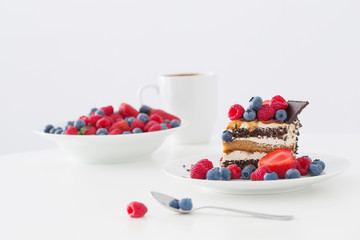 healthy dessert with different berries on white background