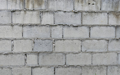 dirty grey white brick wall 
