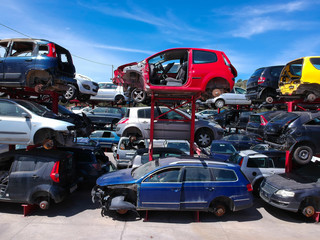 Naklejka premium Cars in junkyard, pile for recycling.