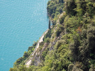 Lake Garda, Italy. Aerial view of the amazing and panoramic road built on the shores of the lake. The road is called Gardesana
