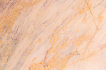patterned detailed of orange cream marble texture, background and interior design.