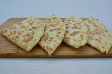 Georgian khachapuri imeruli. Georgian traditional food, hot khachapuri