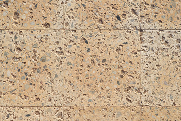 Yellow terrazzo square brick pavement background