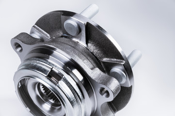 New Wheel hub assembly with bearing. This is part of the car suspension on a gray background with a...