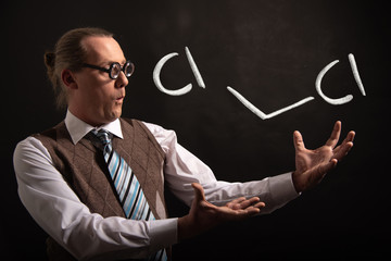 Professor presenting handdrawn chemical formula of dichloromethane