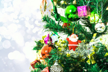 Tree and Christmas decorations. Beautiful decorated with present boxes in a winter landscape with snow. Can be used for background or wallpaper.
