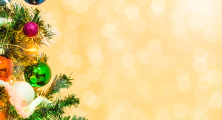 Tree and Christmas decorations. Beautiful decorated with present boxes in a winter landscape with snow. Can be used for background or wallpaper.