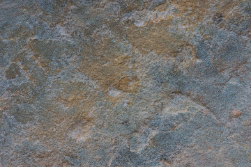 Colorful rock sandstone texture background closeup