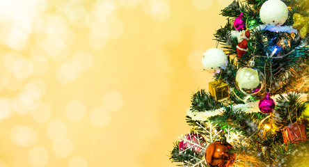 Tree and Christmas decorations. Beautiful decorated with present boxes in a winter landscape with snow. Can be used for background or wallpaper.