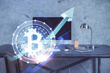 Double exposure of blockchain and crypto economy theme hologram and table with computer background. Concept of bitcoin cryptocurrency.