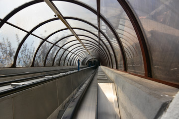 escalators in a crystal tunnel