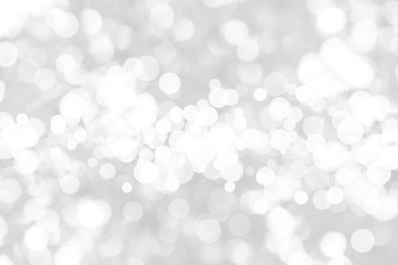 Abstract background with White bokeh on gray background. christmas blurred beautiful shiny Christmas lights.