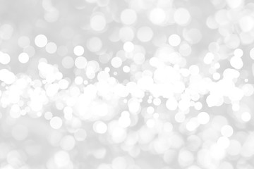 Abstract background with White bokeh on gray background. christmas blurred beautiful shiny Christmas lights.