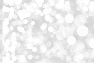 Abstract background with White bokeh on gray background. christmas blurred beautiful shiny Christmas lights.